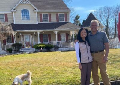 Happy Home Owners with New Roof on Long Island